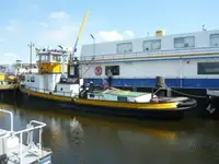 Tug with pushbar&CAT